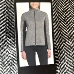 NWT Jacket size XXL fits 14 and up. Flattering style and design